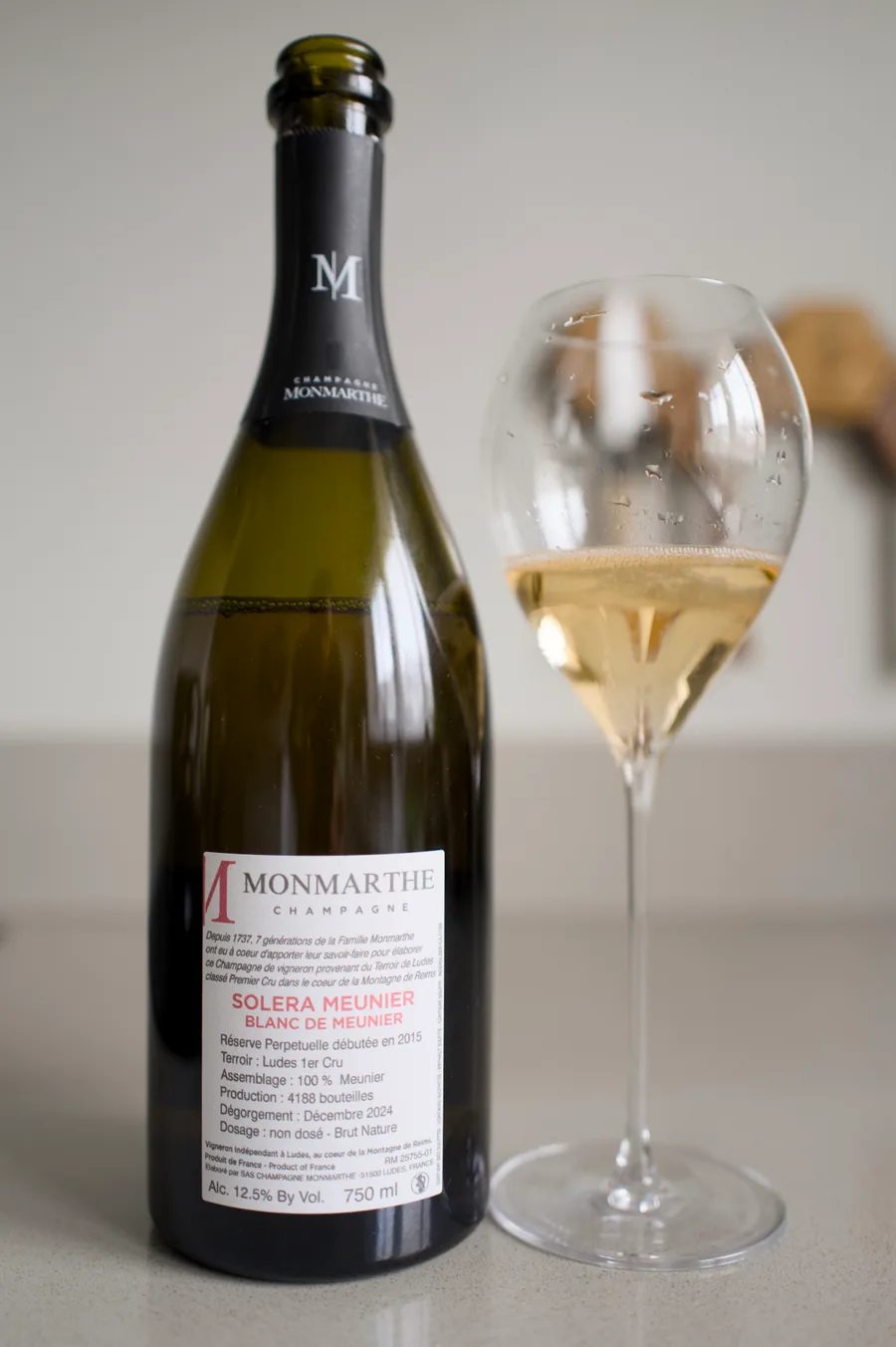 Back label of Champagne Monmarthe Solera Blanc de Meunier showing the solera specifications