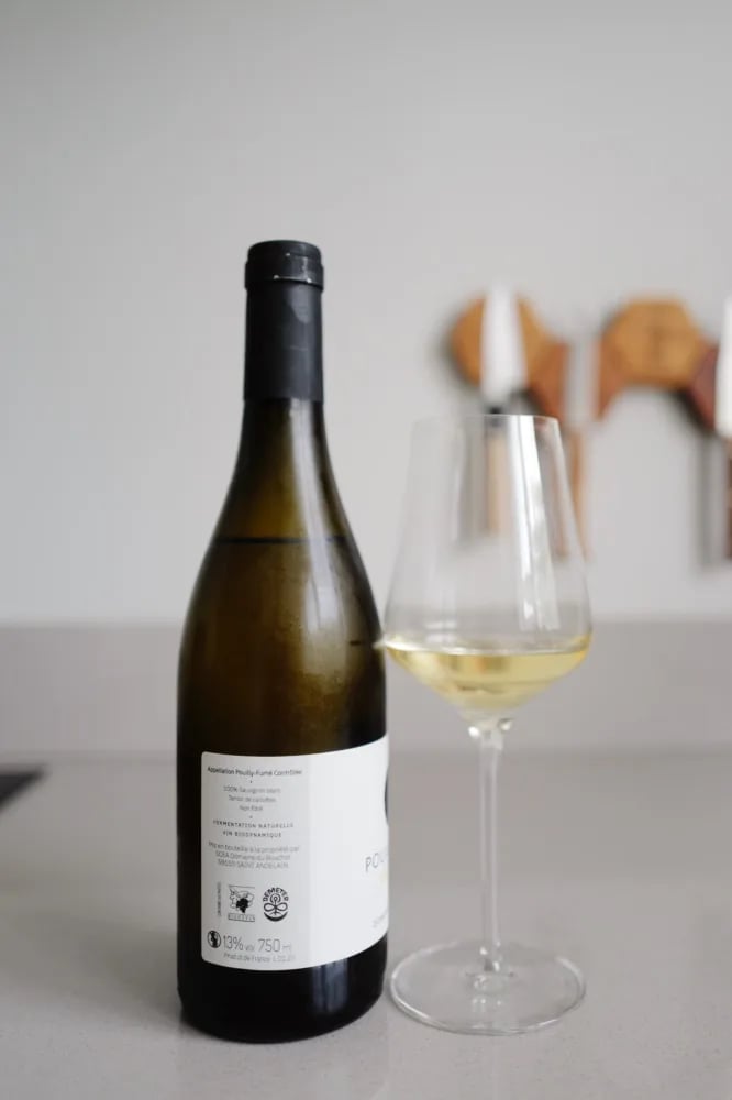Achteretiket van Pouilly-Fumé Caillottes 2023 met vermelding van terroir de caillottes, natuurlijke fermentatie en 13 procent