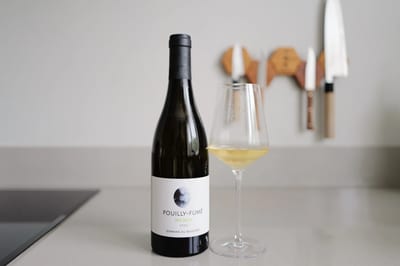Bottle of Pouilly-Fumé MCMLV 2023 from Domaine du Bouchot beside a poured glass