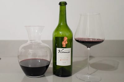 Bottle of Colección Vivanco 4 Varietales 2019 Rioja beside a decanter and a glass of red wine