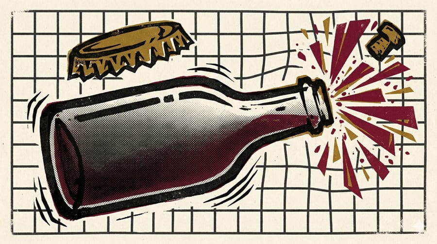 Hazy pét-nat bottle with crown cap and hand-drawn label on wooden table